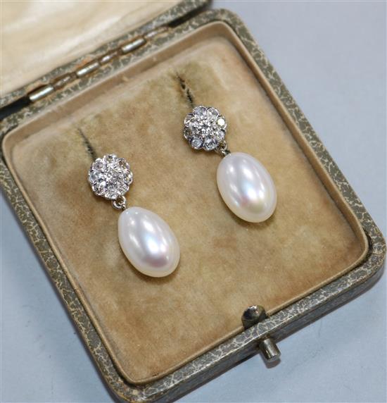 A pair of 18ct white gold, cultured pearl and diamond drop earrings, 23mm.